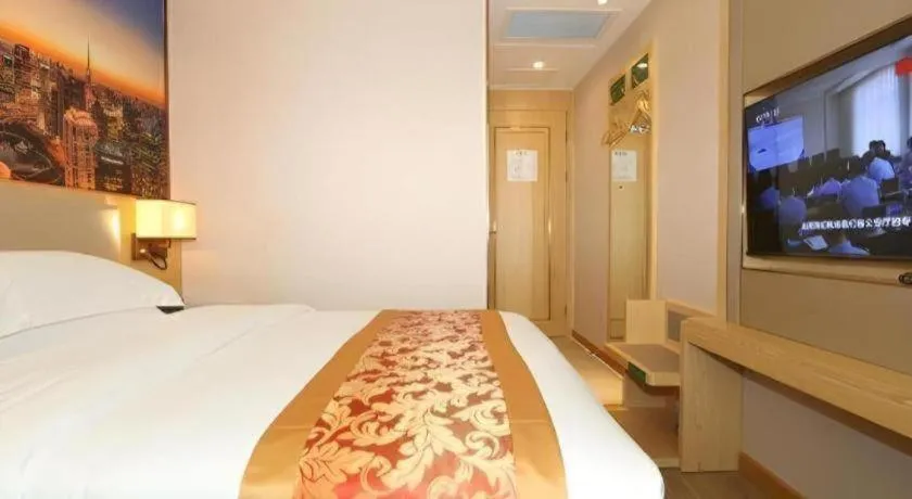 Bed in SHANGJINGHAO HOTEL （SAKATA SNOW ELEPHANT SUBWAY STATION SHOP）