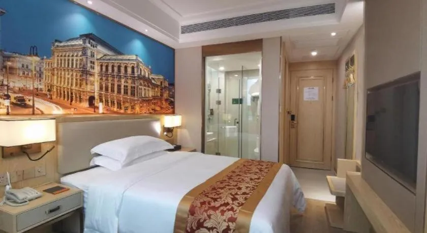 Bed in SHANGJINGHAO HOTEL （SAKATA SNOW ELEPHANT SUBWAY STATION SHOP）