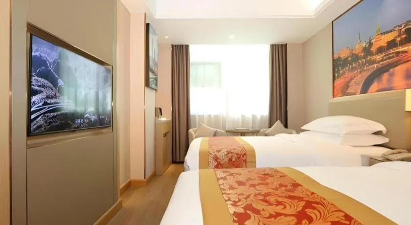 Bed in SHANGJINGHAO HOTEL （SAKATA SNOW ELEPHANT SUBWAY STATION SHOP）