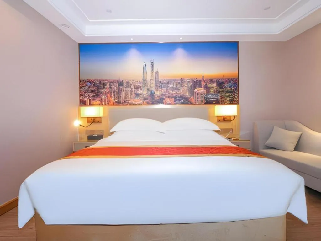 Bed in SHANGJINGHAO HOTEL （SAKATA SNOW ELEPHANT SUBWAY STATION SHOP）