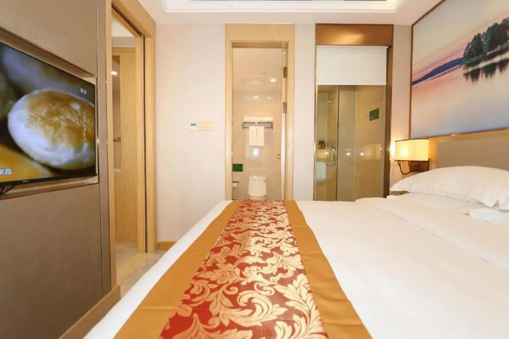 Bed in SHANGJINGHAO HOTEL （SAKATA SNOW ELEPHANT SUBWAY STATION SHOP）