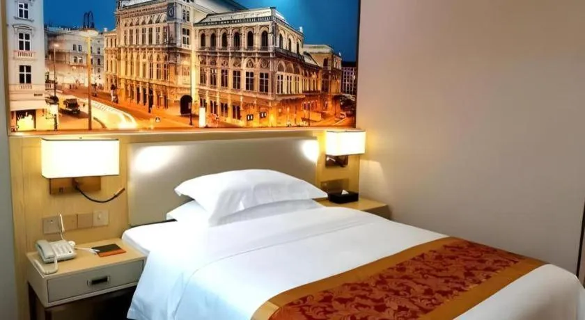 Bed in SHANGJINGHAO HOTEL （SAKATA SNOW ELEPHANT SUBWAY STATION SHOP）