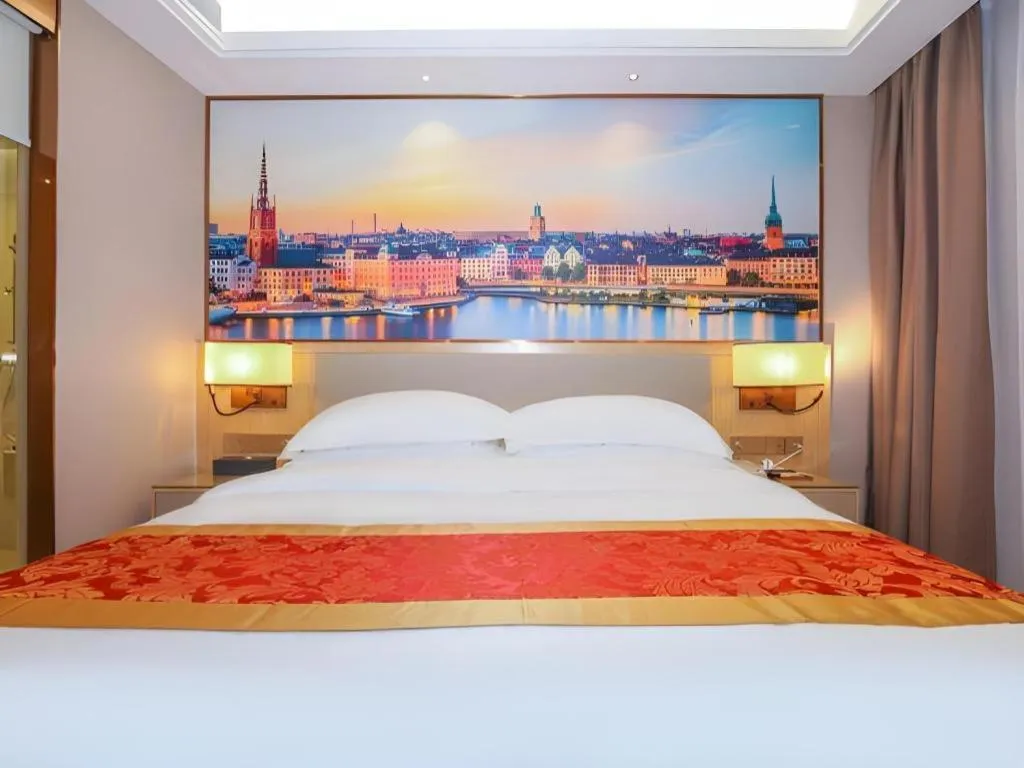 Bed in SHANGJINGHAO HOTEL （SAKATA SNOW ELEPHANT SUBWAY STATION SHOP）