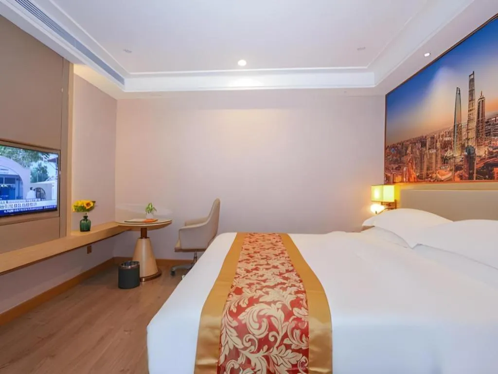 Bed in SHANGJINGHAO HOTEL （SAKATA SNOW ELEPHANT SUBWAY STATION SHOP）