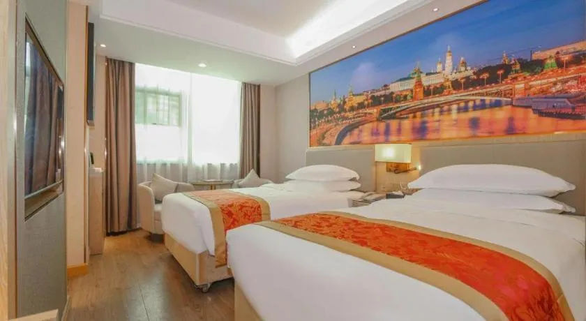 Bed in SHANGJINGHAO HOTEL （SAKATA SNOW ELEPHANT SUBWAY STATION SHOP）