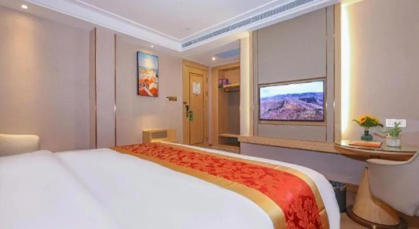 Bed in SHANGJINGHAO HOTEL （SAKATA SNOW ELEPHANT SUBWAY STATION SHOP）