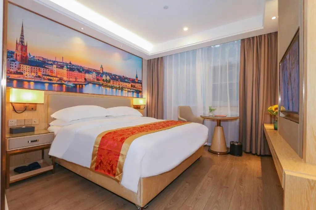 Bed in SHANGJINGHAO HOTEL （SAKATA SNOW ELEPHANT SUBWAY STATION SHOP）