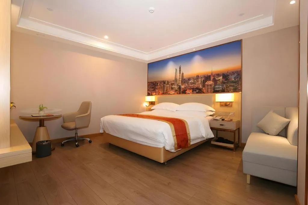 Bed in SHANGJINGHAO HOTEL （SAKATA SNOW ELEPHANT SUBWAY STATION SHOP）