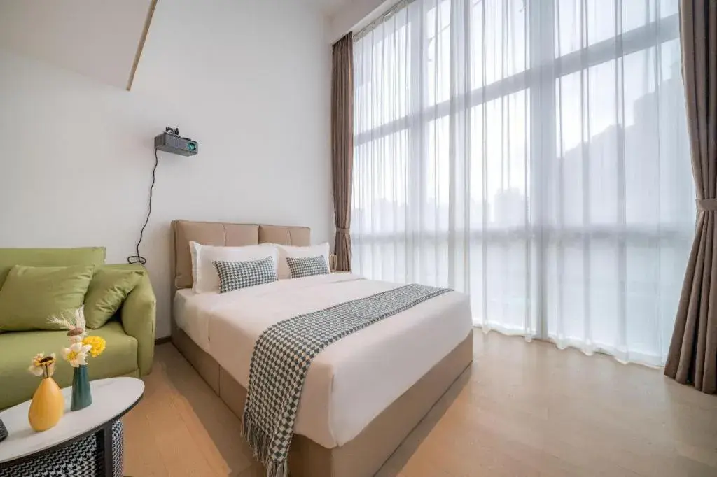 Bed in F-TOWN Fangtang Hotel (Shenzhen Longgang Tian'an Digital City Huanggekeng Subway Station) Bed in F-TOWN Fangtang Hotel (Shenzhen Longgang Tian'an Digital City Huanggekeng Subway Station)