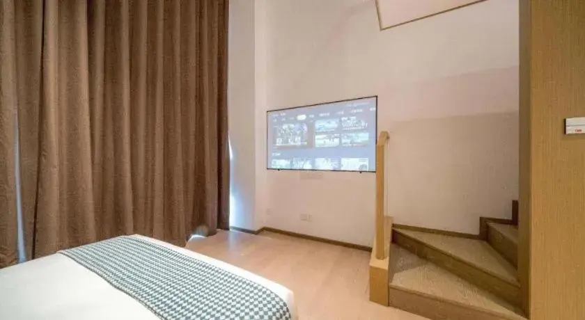 Bed in F-TOWN Fangtang Hotel (Shenzhen Longgang Tian'an Digital City Huanggekeng Subway Station) Bed in F-TOWN Fangtang Hotel (Shenzhen Longgang Tian'an Digital City Huanggekeng Subway Station)