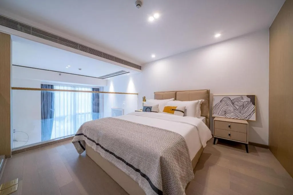 Bed in F-TOWN Fangtang Hotel (Shenzhen Longgang Tian'an Digital City Huanggekeng Subway Station)