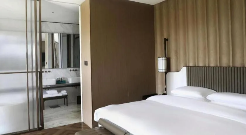 Bed in Mumian Rizhao Hotel