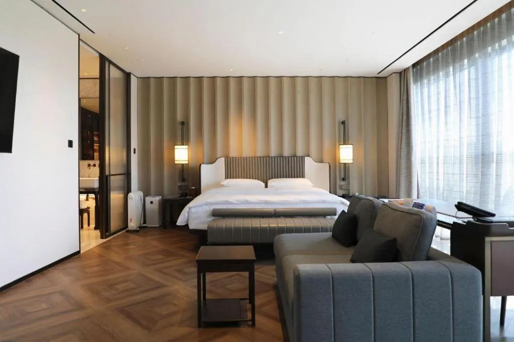 Bed in Mumian Rizhao Hotel