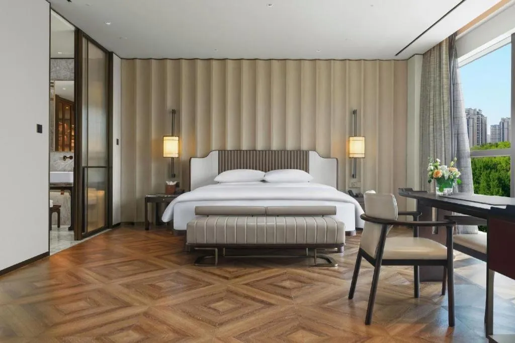 Bed in Mumian Rizhao Hotel