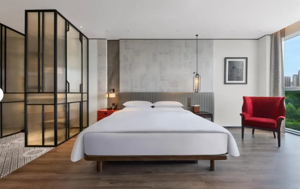 Bed in Mumian Rizhao Hotel