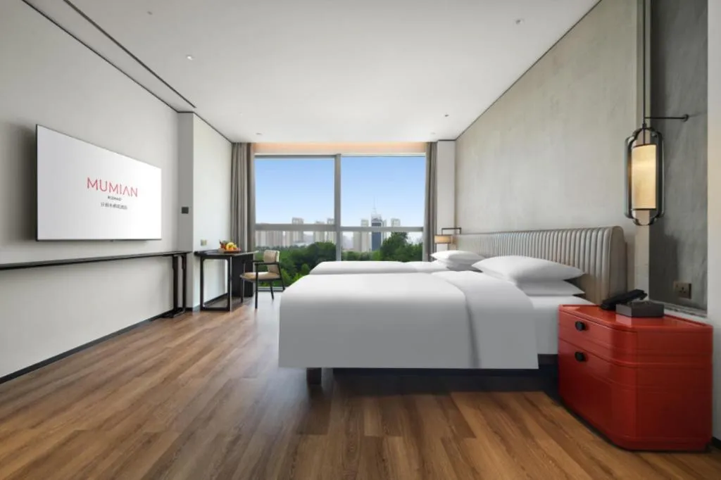 Bed in Mumian Rizhao Hotel