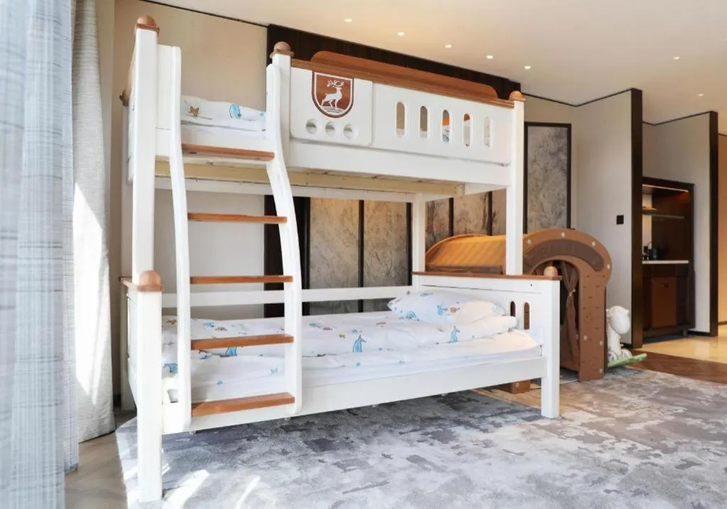 Bed in Mumian Rizhao Hotel