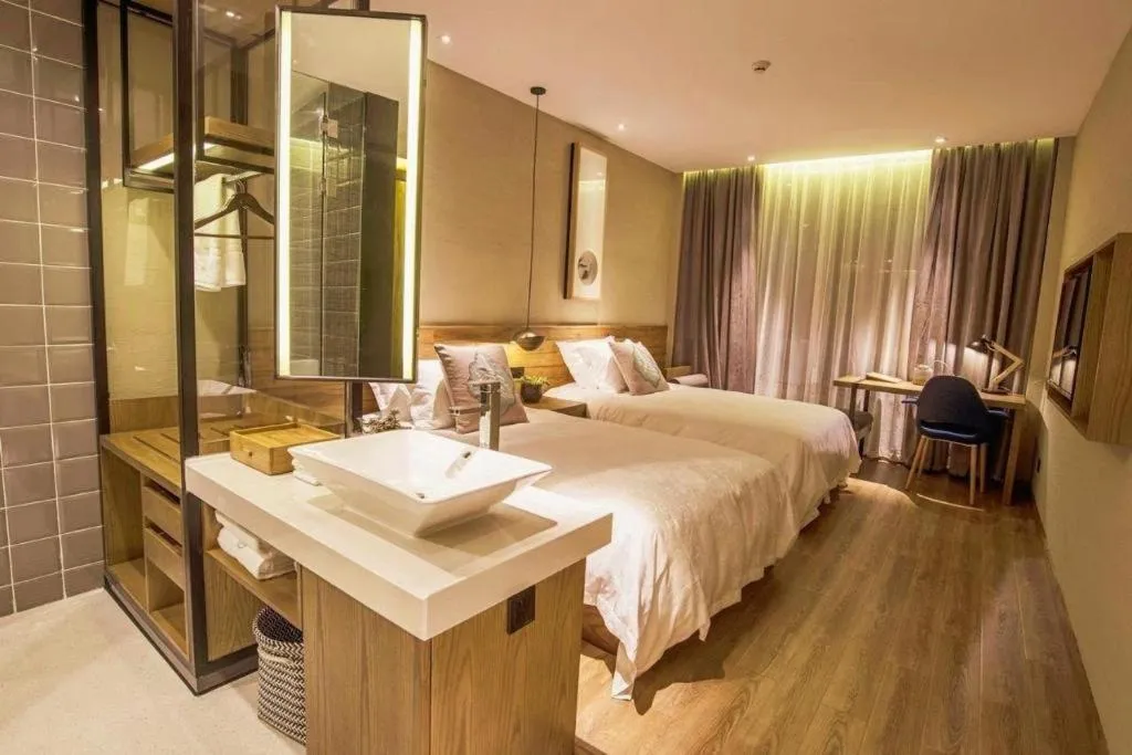 Bed in Yiqi Ecological Art Hotel Hangzhou Xixi Wetland Park Branch