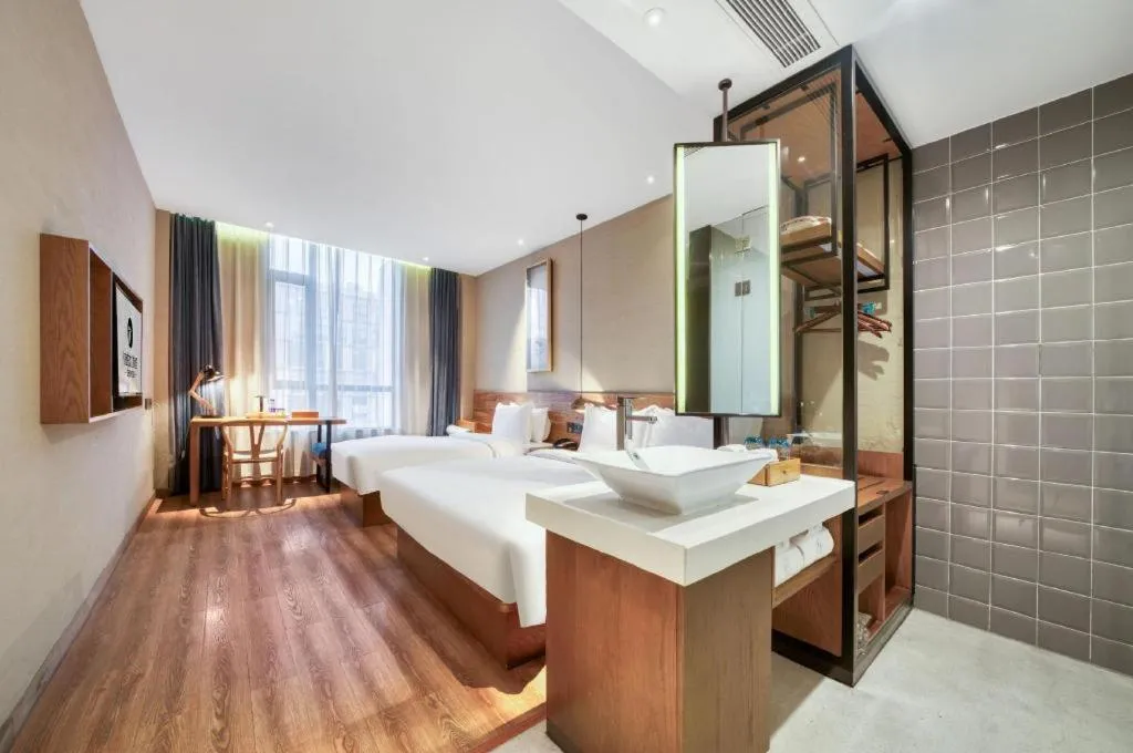 Bed in Yiqi Ecological Art Hotel Hangzhou Xixi Wetland Park Branch