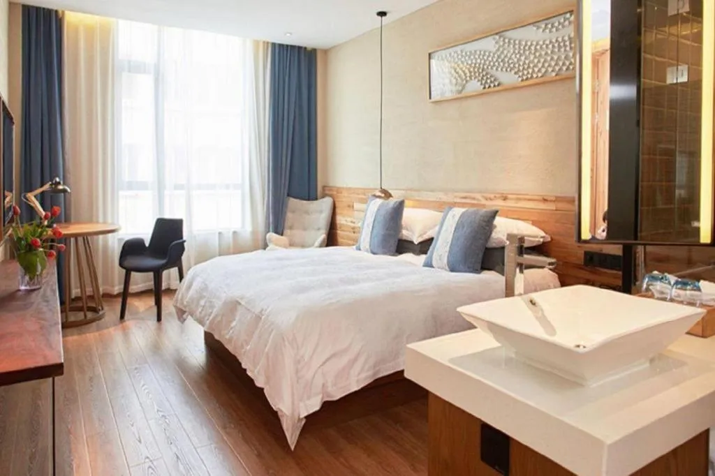 Bed in Yiqi Ecological Art Hotel Hangzhou Xixi Wetland Park Branch