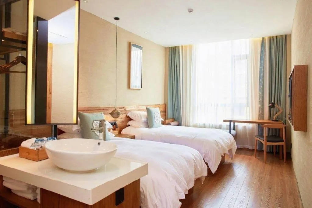 Bed in Yiqi Ecological Art Hotel Hangzhou Xixi Wetland Park Branch