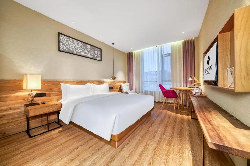 Bed in Yiqi Ecological Art Hotel Hangzhou Xixi Wetland Park Branch