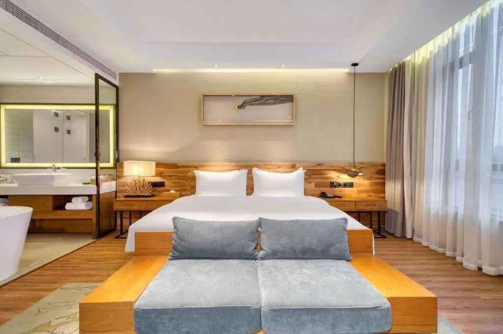 Bed in Yiqi Ecological Art Hotel Hangzhou Xixi Wetland Park Branch Bed in Yiqi Ecological Art Hotel Hangzhou Xixi Wetland Park Branch