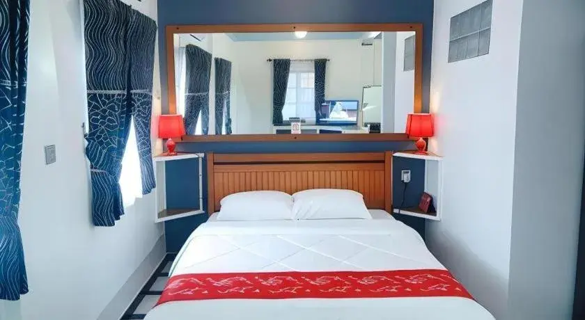 Bed in Sunset Curly Bay Hotel & Resort Bed in Sunset Curly Bay Hotel & Resort