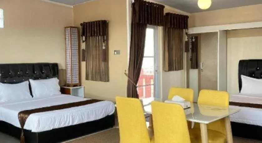 Bed in Sunset Curly Bay Hotel & Resort