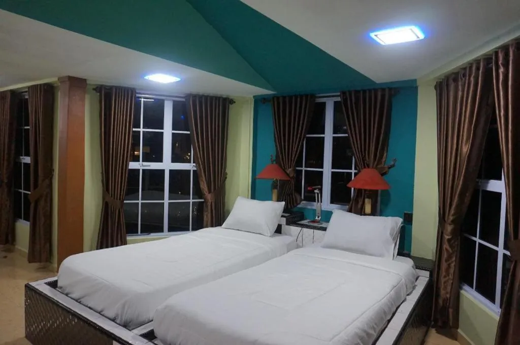 Bed in Sunset Curly Bay Hotel & Resort