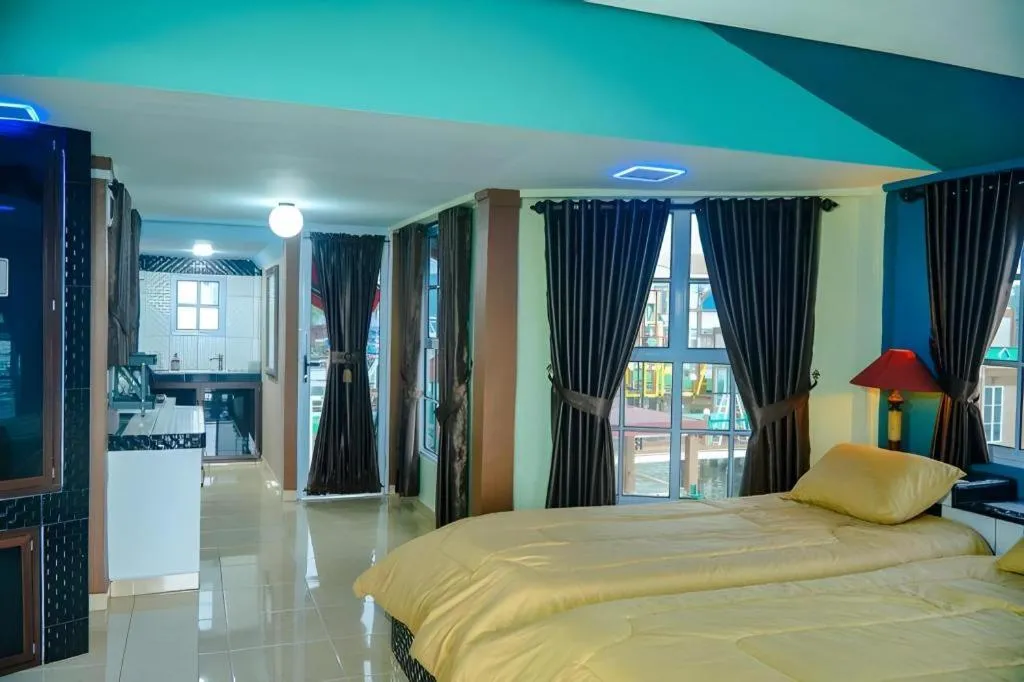 Bed in Sunset Curly Bay Hotel & Resort