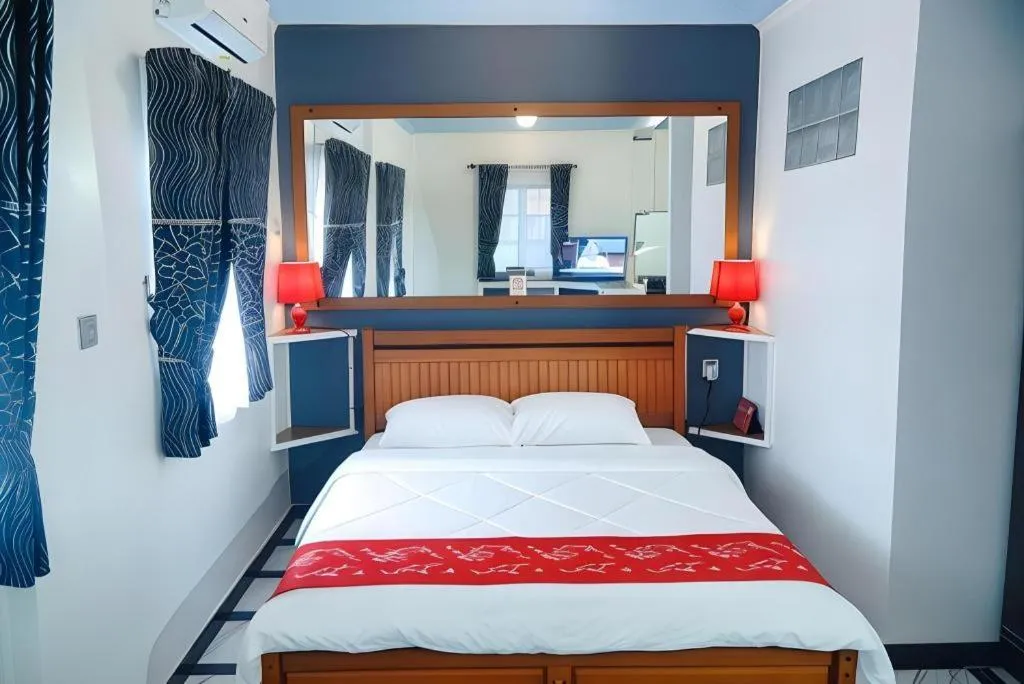 Bed in Sunset Curly Bay Hotel & Resort