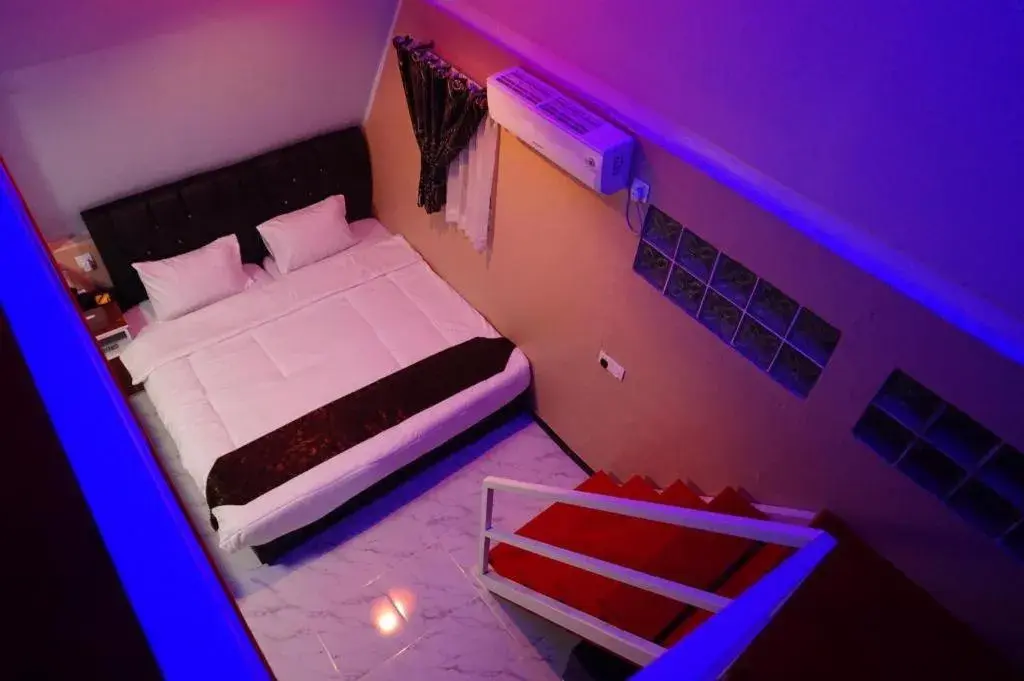 Bed in Sunset Curly Bay Hotel & Resort Bed in Sunset Curly Bay Hotel & Resort