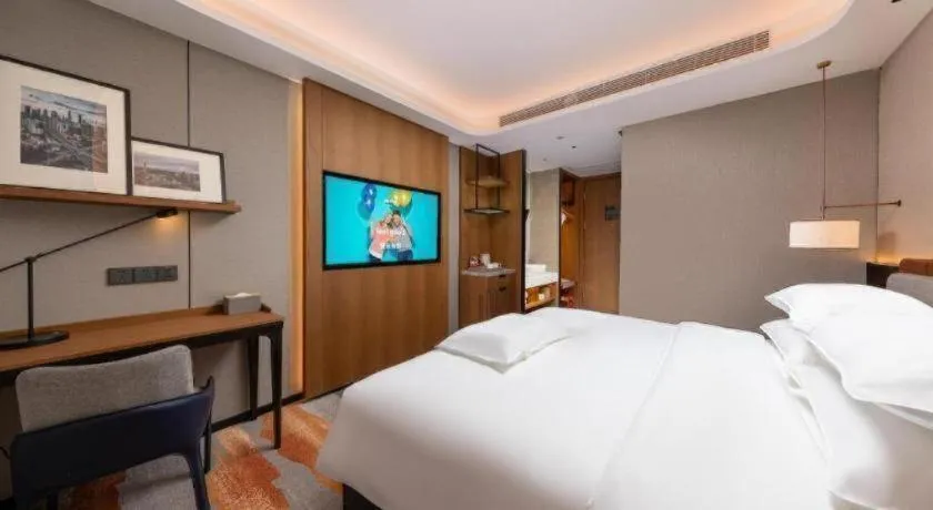 Bed in Park Inn Guangzhou Railway Station Yuexiu International Convention Center