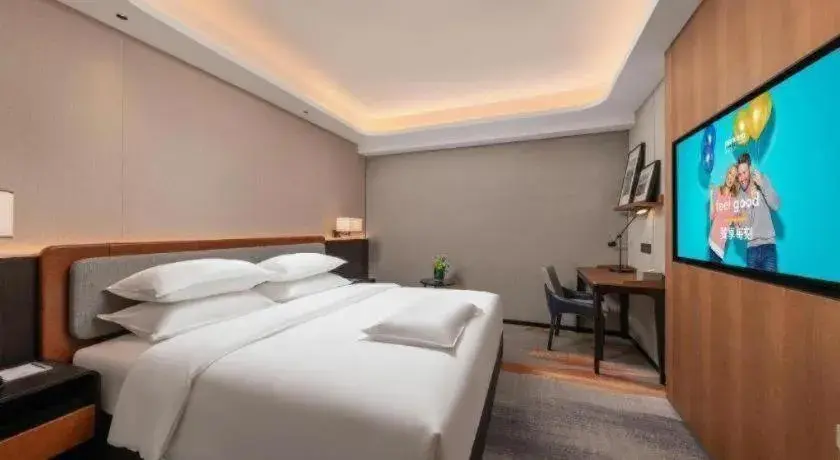 Bed in Park Inn Guangzhou Railway Station Yuexiu International Convention Center Bed in Park Inn Guangzhou Railway Station Yuexiu International Convention Center