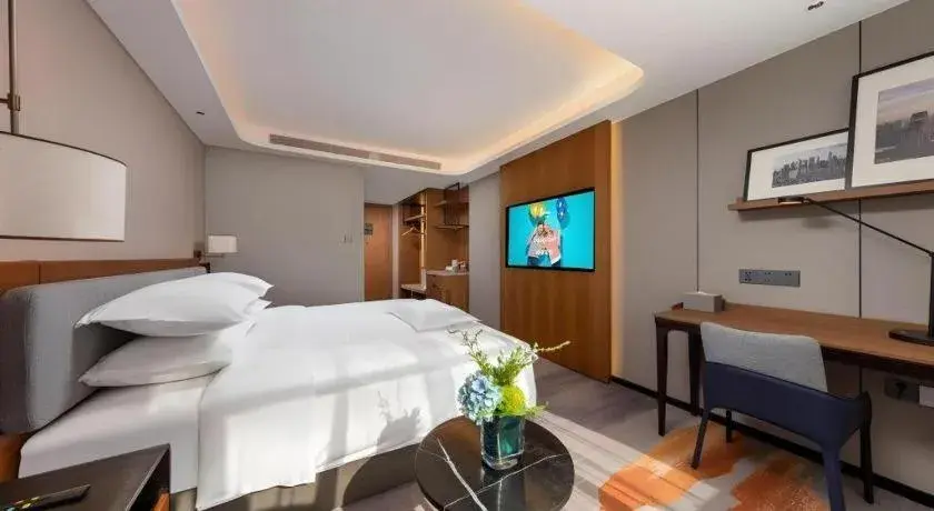 Bed in Park Inn Guangzhou Railway Station Yuexiu International Convention Center Bed in Park Inn Guangzhou Railway Station Yuexiu International Convention Center