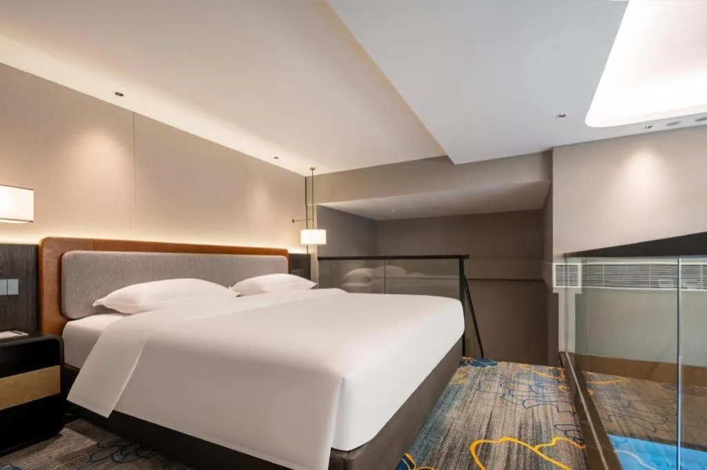 Bed in Park Inn Guangzhou Railway Station Yuexiu International Convention Center