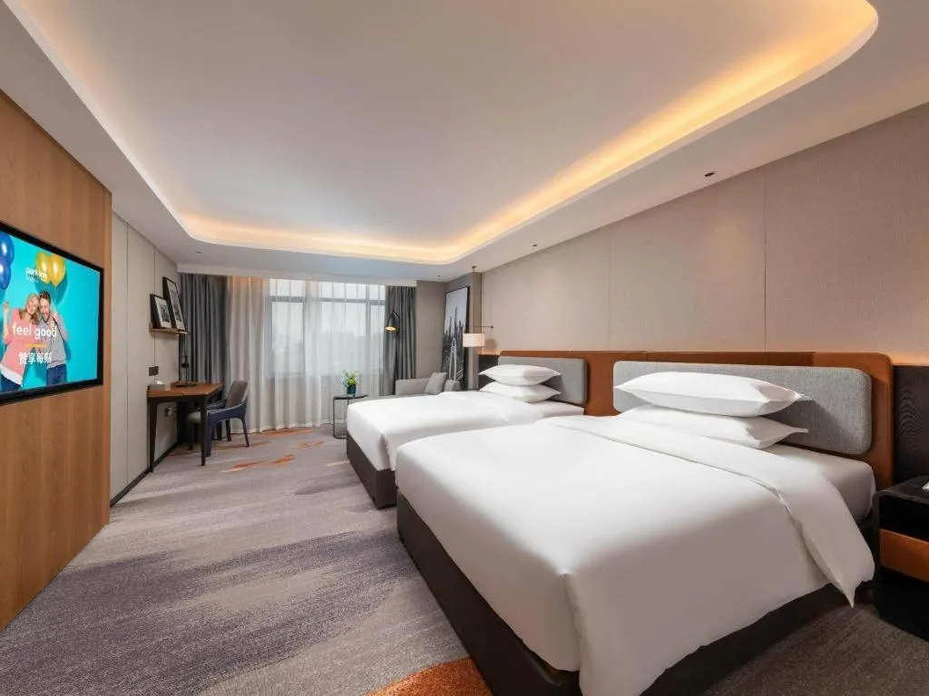 Bed in Park Inn Guangzhou Railway Station Yuexiu International Convention Center