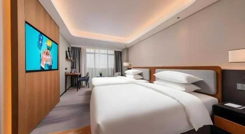 Bed in Park Inn Guangzhou Railway Station Yuexiu International Convention Center