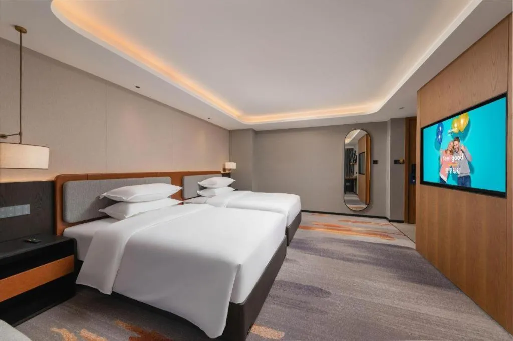 Bed in Park Inn Guangzhou Railway Station Yuexiu International Convention Center