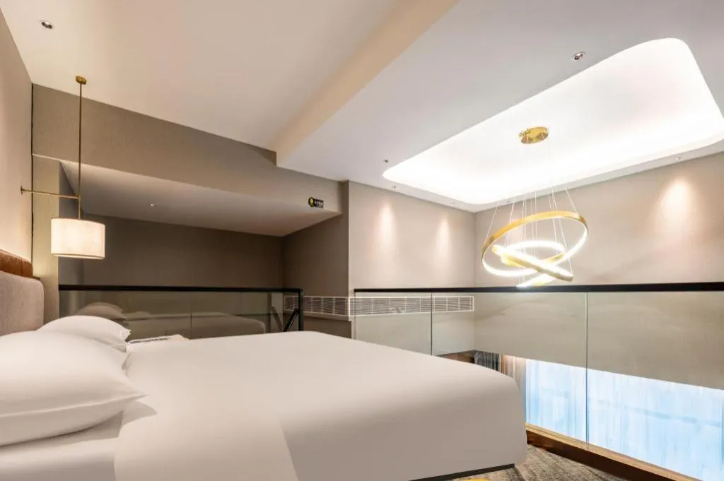 Bed in Park Inn Guangzhou Railway Station Yuexiu International Convention Center