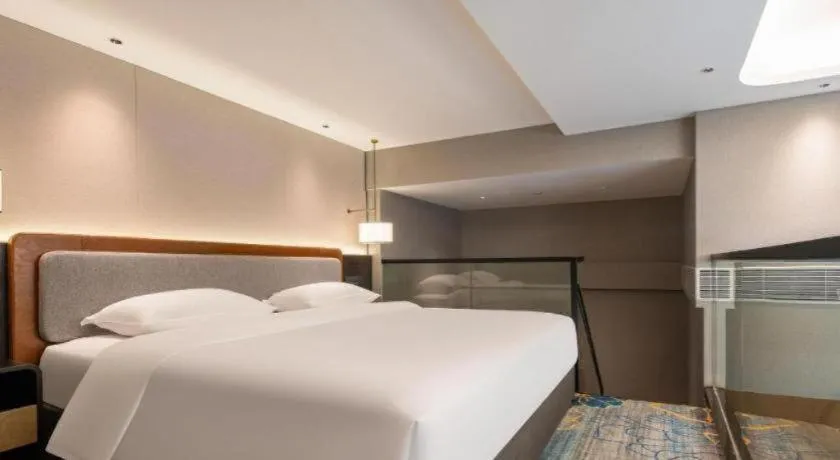 Bed in Park Inn Guangzhou Railway Station Yuexiu International Convention Center