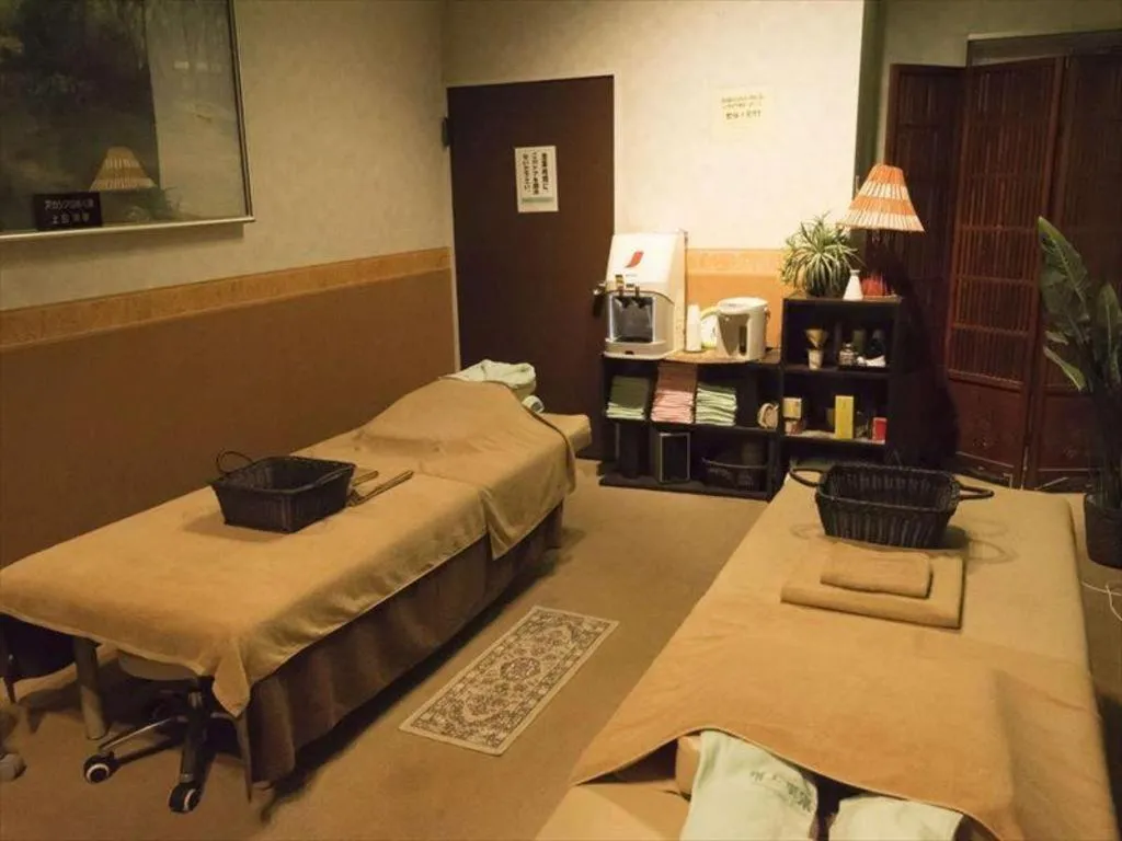 Bed in Mikuni Ocean Resort & Hotel