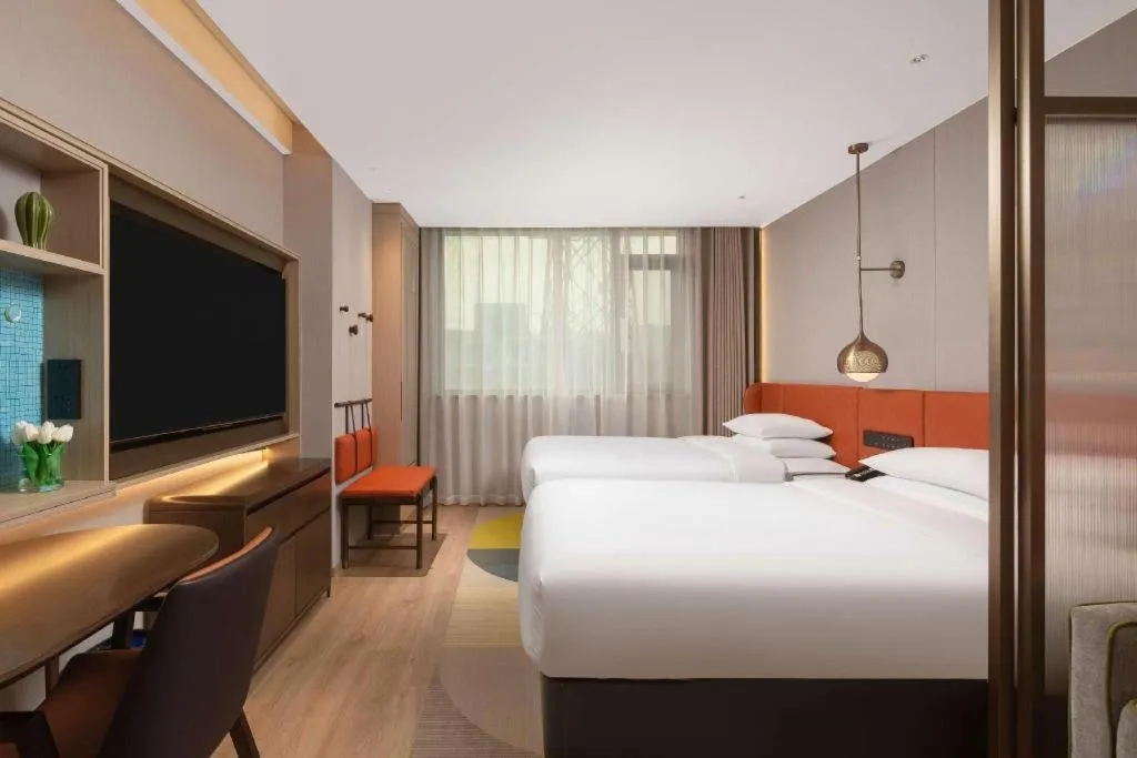 Bed in Home2 Suites by Hilton Xishuangbanna