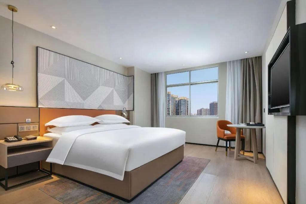 Bed in Borrman Hotel Jinhua Yiwu International Trade Mall