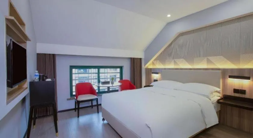 Bed in Borrman Hotel Jinhua Yiwu International Trade Mall