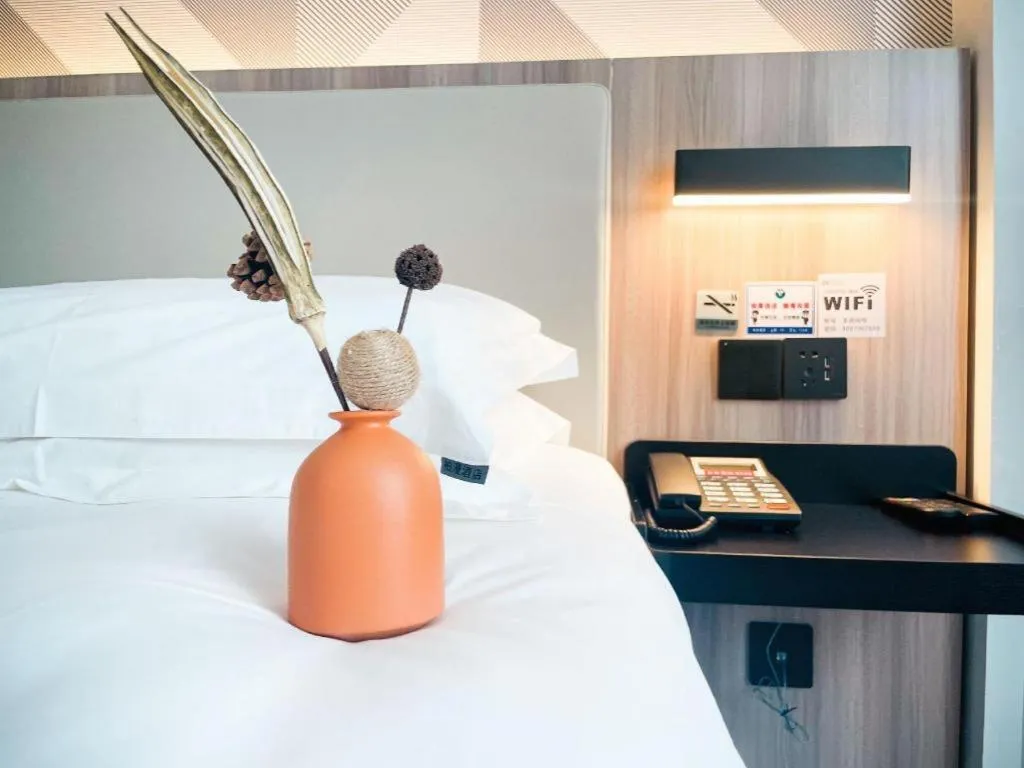 Bed in Borrman Hotel Jinhua Yiwu International Trade Mall