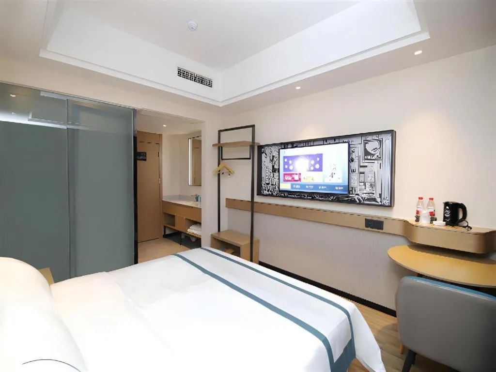 Bed in City Comfort Inn Changsha Sifangping University of National Defense Science and Technology