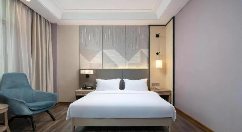 Bed in Borrman Hotel Changsha Yueliang Dao Guanziling Metro Station