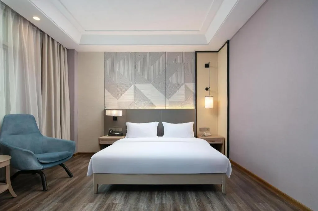 Bed in Borrman Hotel Changsha Yueliang Dao Guanziling Metro Station